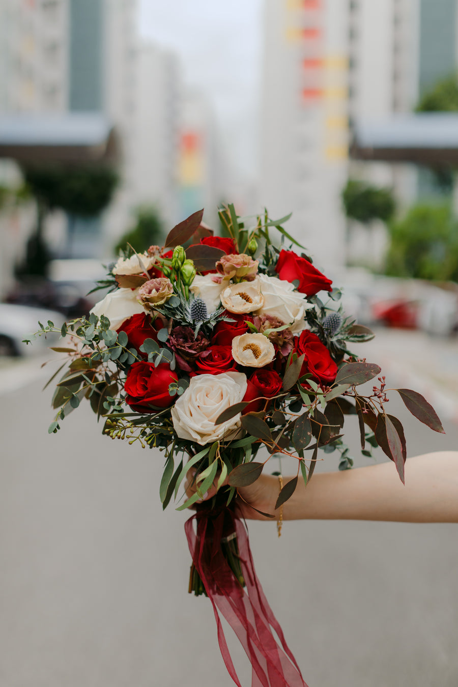 Canvas of Blooming Red Bridal Bouquet